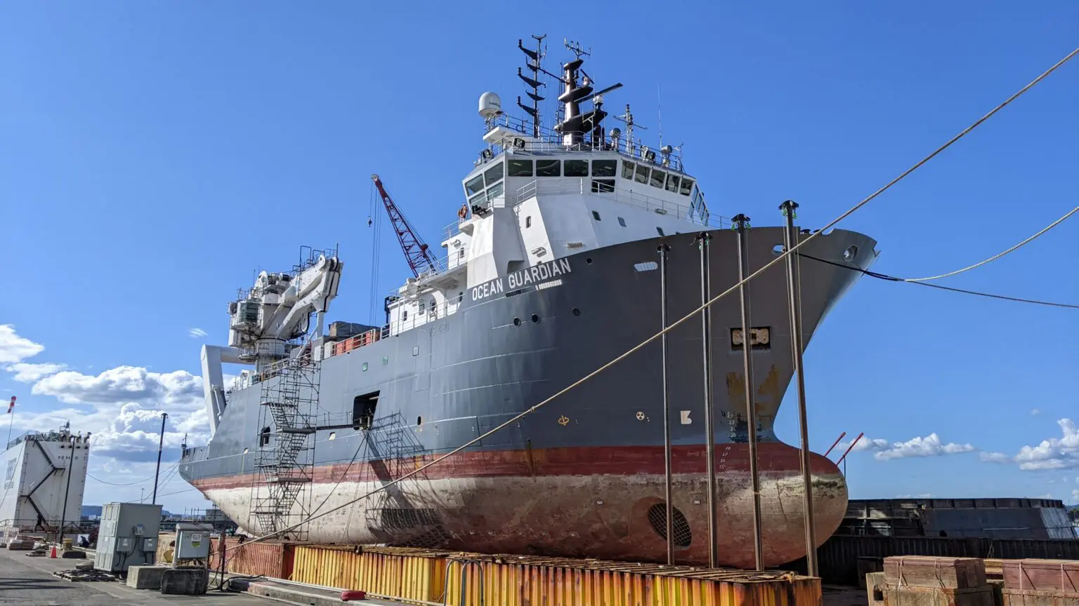 A large ship sitting on top of the water.