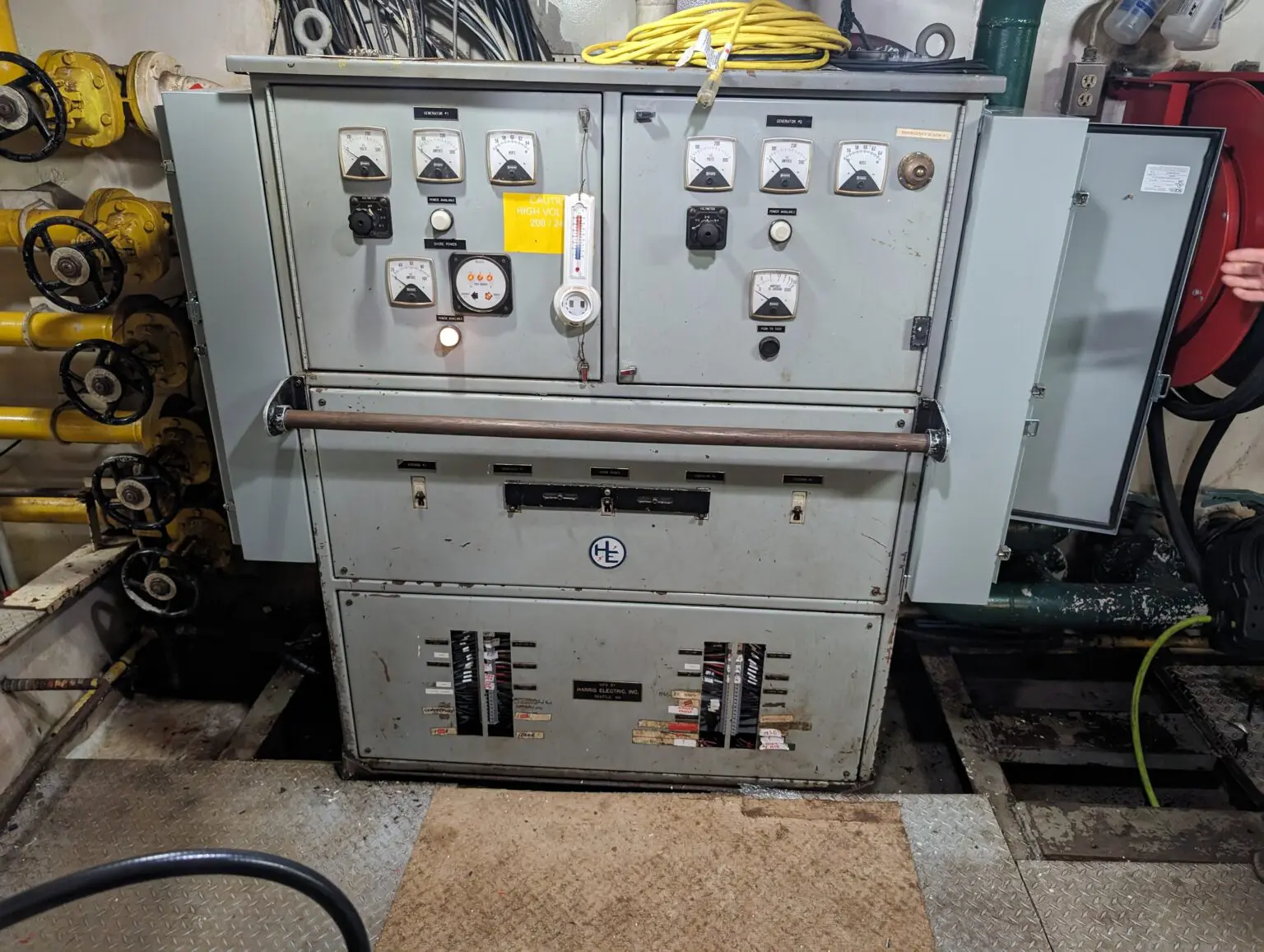 A large electrical box sitting on the floor.